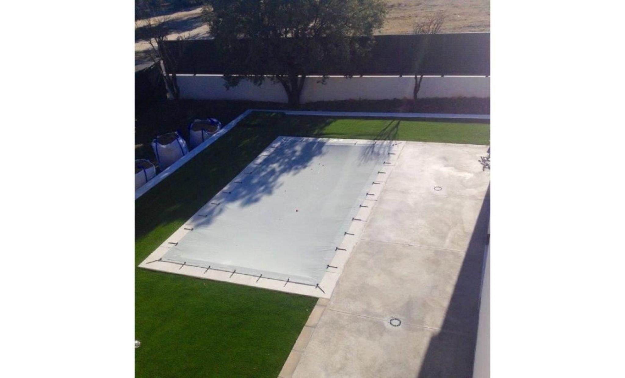 bâche de piscine d'hiver de 11,80x5,80 mètres. couleur bleu   noir. pas cher