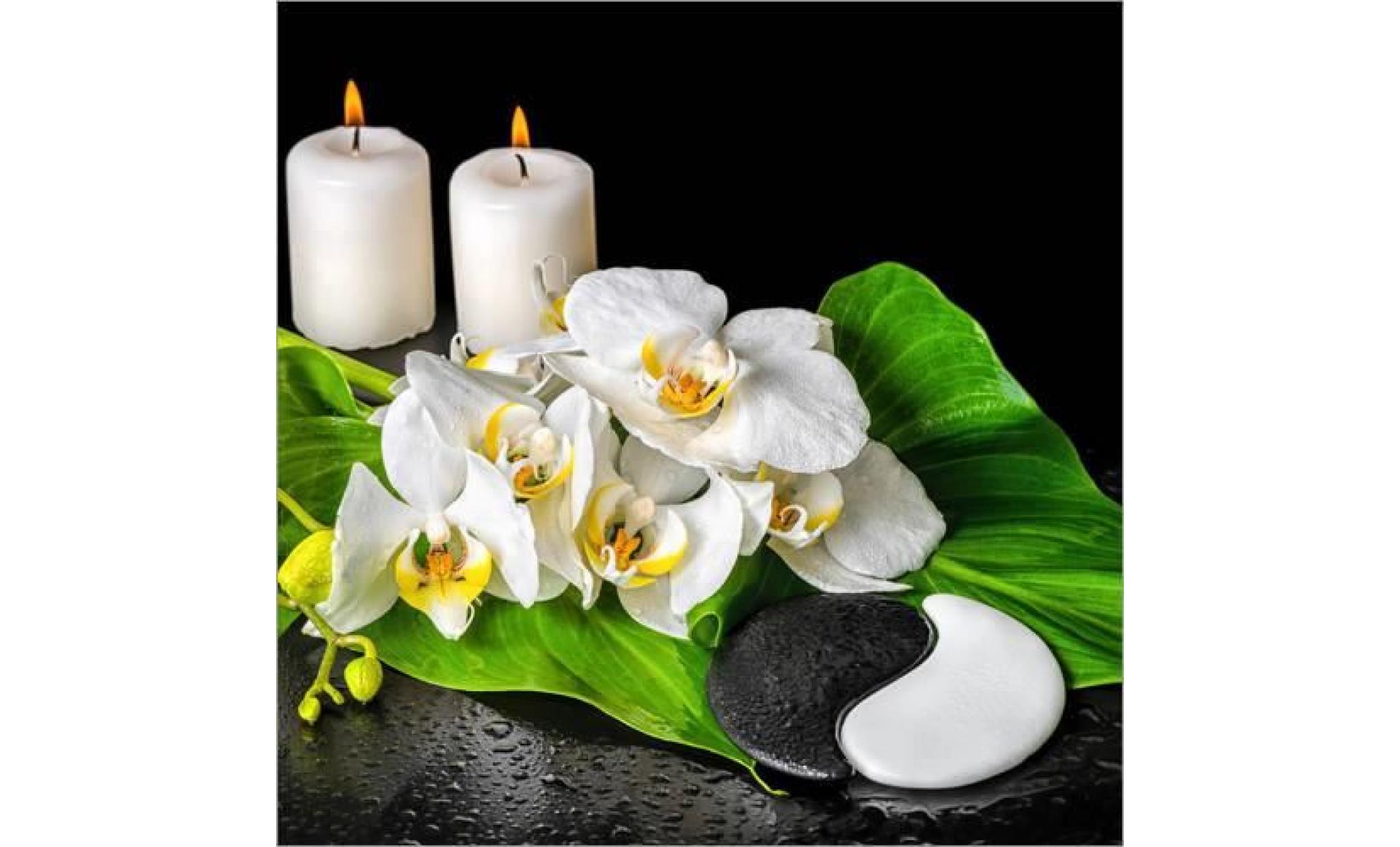 spa concept with candles and orchids